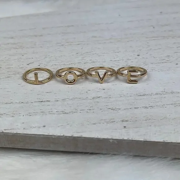 💕 NWOT Gold Tone L O V E Midi Ring Set Size 3 - 3.5 LOVE Stacking Rings - Picture 5 of 14